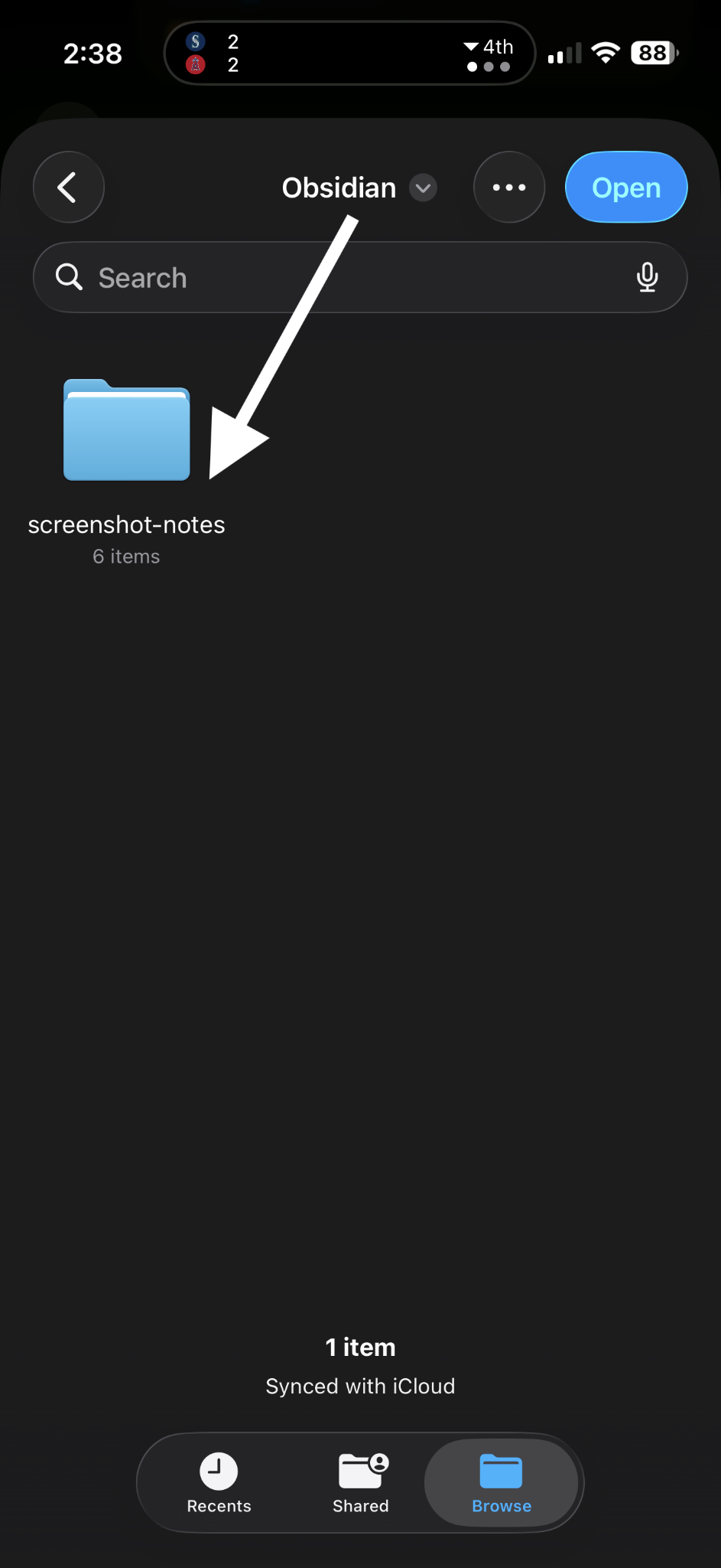 Inside the Obsidian folder in iCloud Drive, showing the screenshot-notes subfolder with an Open button in the top right. A white arrow points to the Open button.